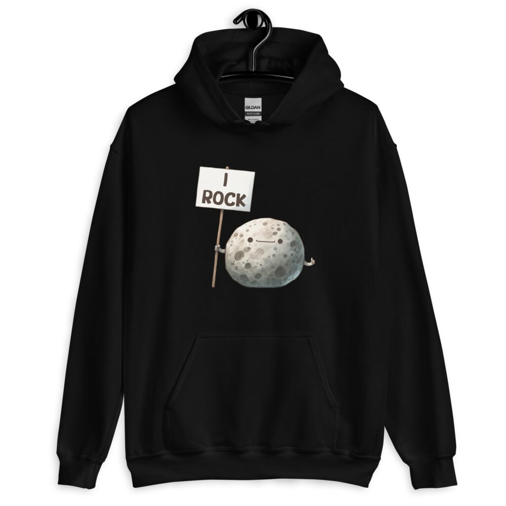 Black hoodie sweatshirt that has an image of a grey rock that is holding a sign. The sign says 'I Rock.' The image is printed on the front of the hoodie.