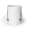 White ceramic mug with funny pastel rainbow unicorn graphics and the words Alpha Male printed on both sides.