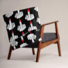 Throw blanket with image of middle finger with long red fingernails silhouette printed all over. The blanket is black and the graphic is white and red. Shown draped over a chair