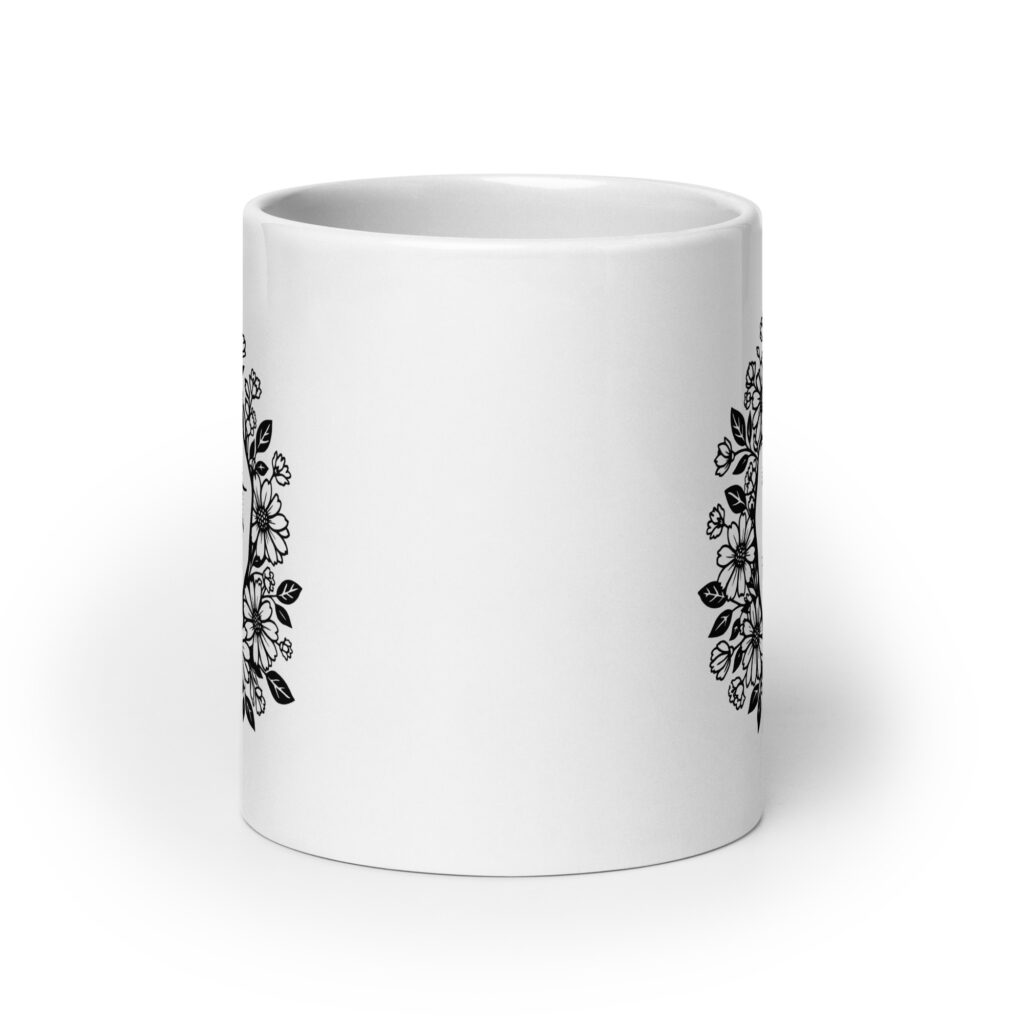 White ceramic mug with with a middle finger design on the front and the text 'I cunt be bothered to be less vulgar' printed on both sides.