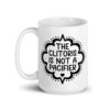 White ceramic mug with the text "The clitoris is not a pacifier" printed on both sides.