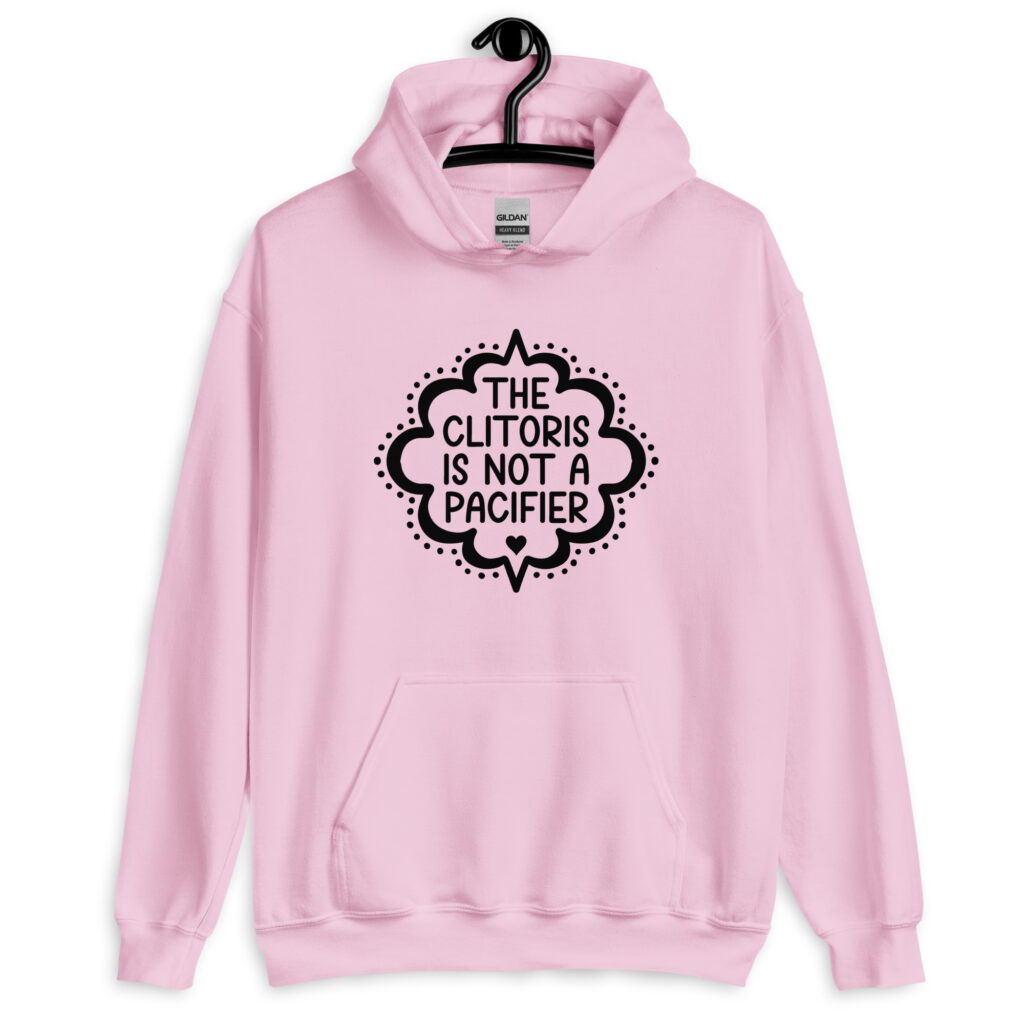Light pink hoodie sweatshirt with the text "The clitoris is not a pacifier" printed on the front.
