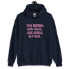 Navy blue hoodie sweatshirt with the text 'The boobs are real, the smile is fake.' printed in pink on the front.