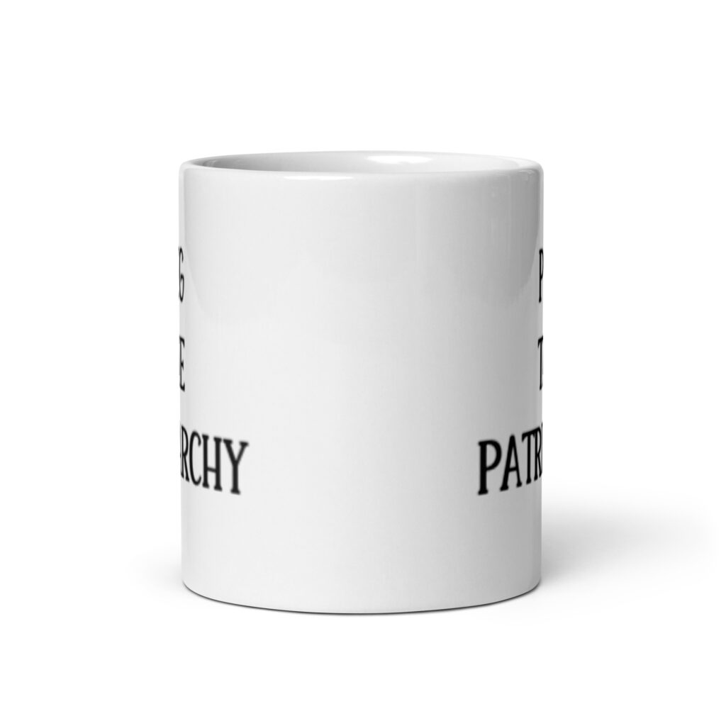 White ceramic mug with the text 'PEG THE PATRIARCHY' printed on both sides.