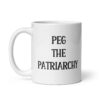White ceramic mug with the text 'PEG THE PATRIARCHY' printed on both sides.