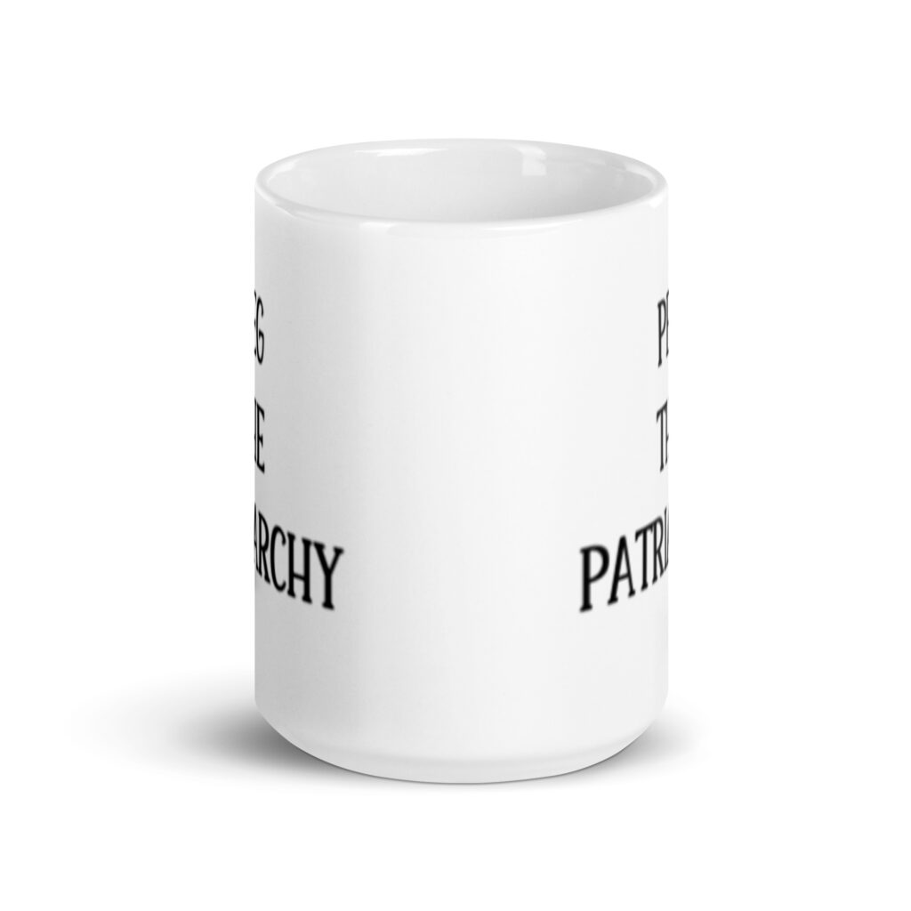 White ceramic mug with the text 'PEG THE PATRIARCHY' printed on both sides.
