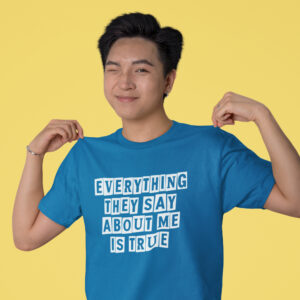 Winking man wearing a sapphire blue t-shirt with the text 'Everything they say about me is true' printed on the front.