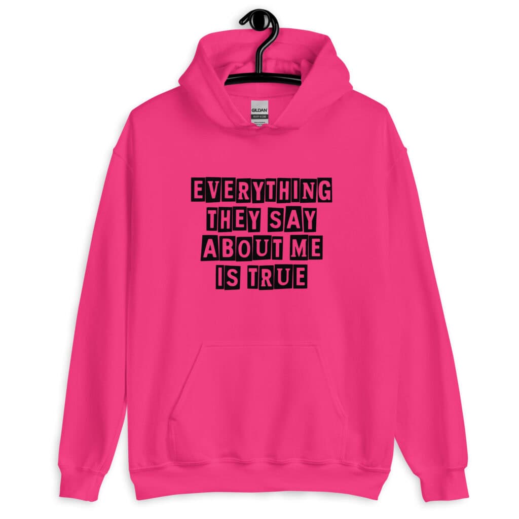 Heliconia pink hoodie sweatshirt with the text 'Everything they say about me is true' printed on the front.