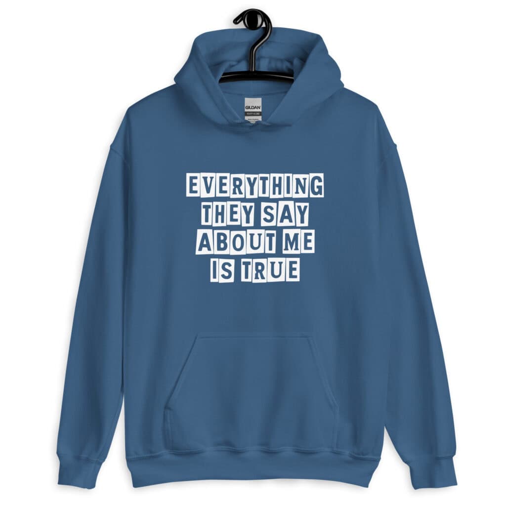 Indigo blue hoodie sweatshirt with the text 'Everything they say about me is true' printed on the front.