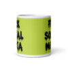 White and lime green ceramic coffee mug with the text 'Fuck social media' printed on the front in drippy graffiti style font on both sides of the mug.