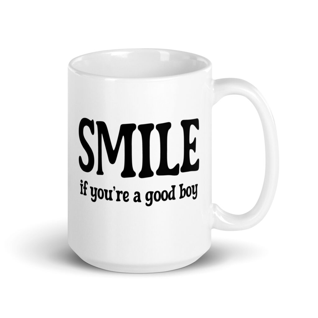 White ceramic mug with the text 'SMILE if you're a good boy' printed on both sides in black,