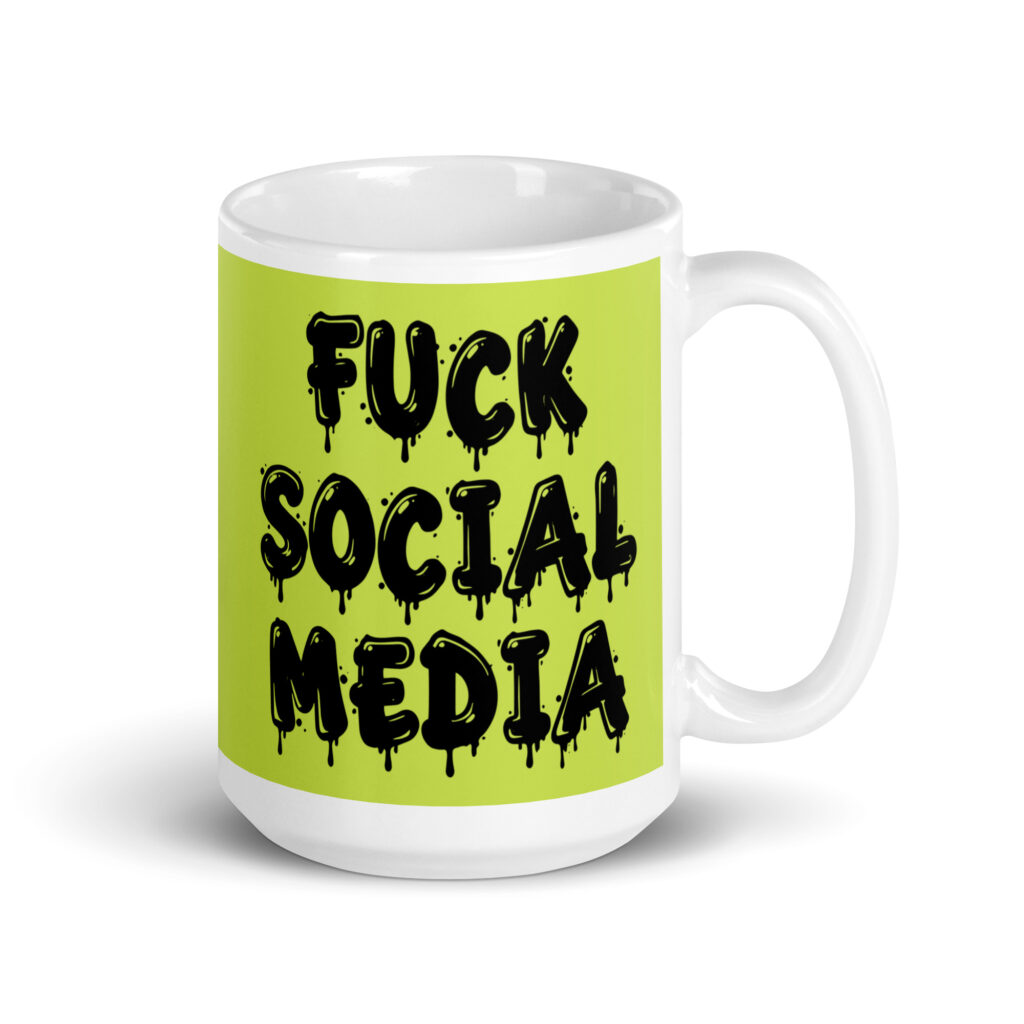 White and lime green ceramic coffee mug with the text 'Fuck social media' printed on the front in drippy graffiti style font on both sides of the mug.