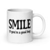 White ceramic mug with the text 'SMILE if you're a good boy' printed on both sides in black,