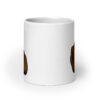 White ceramic mug with a graphic of a brown hand showing the middle finger with red nail polish. The graphic is printed on both sides of the mug.
