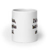 White ceramic mug with text 'I'd be topless, but my nipples are illegal.' printed on both sides in a floral font.