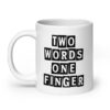 White ceramic mug with the text 'TWO WORDS ONE FINGER' printed in stencil font on both sides of the mug.