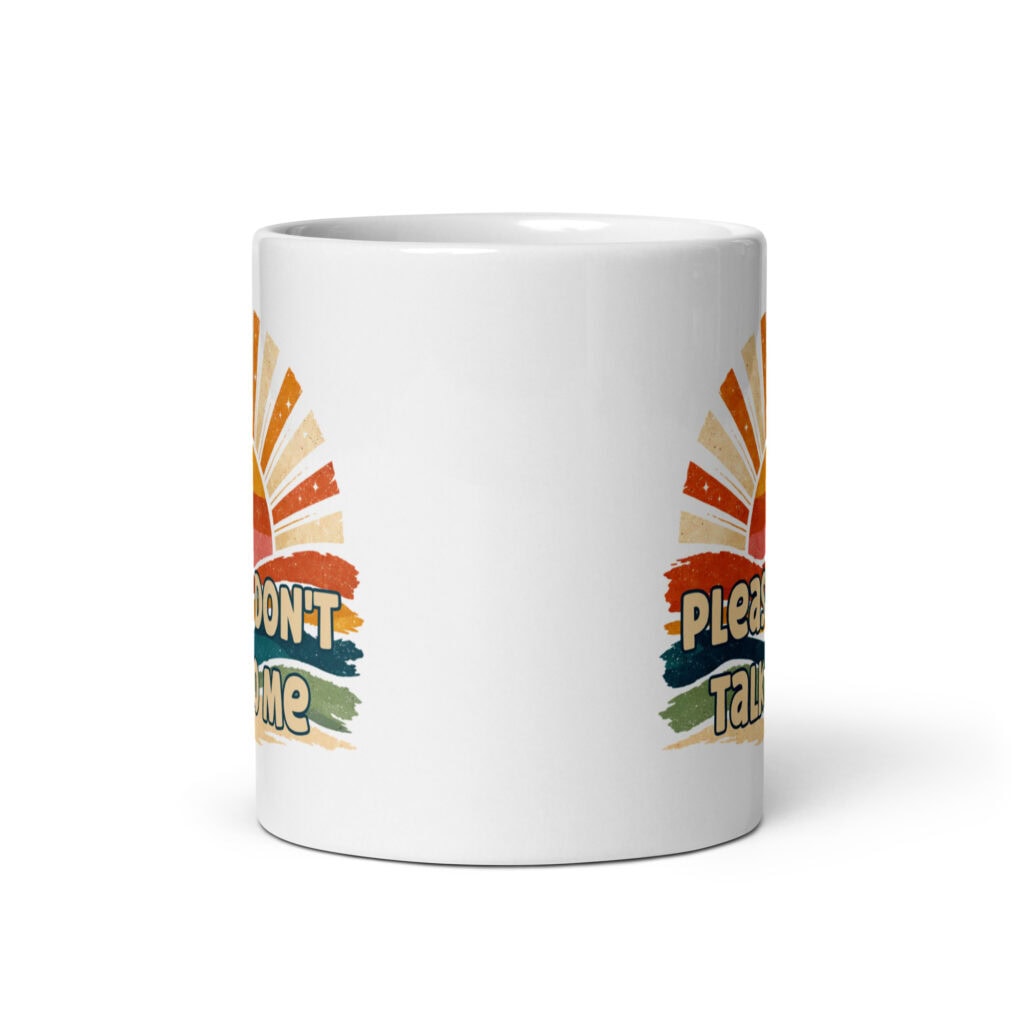 White ceramic mug with a retro sunrise design and the text 'Please don't talk to me' printed on both sides.