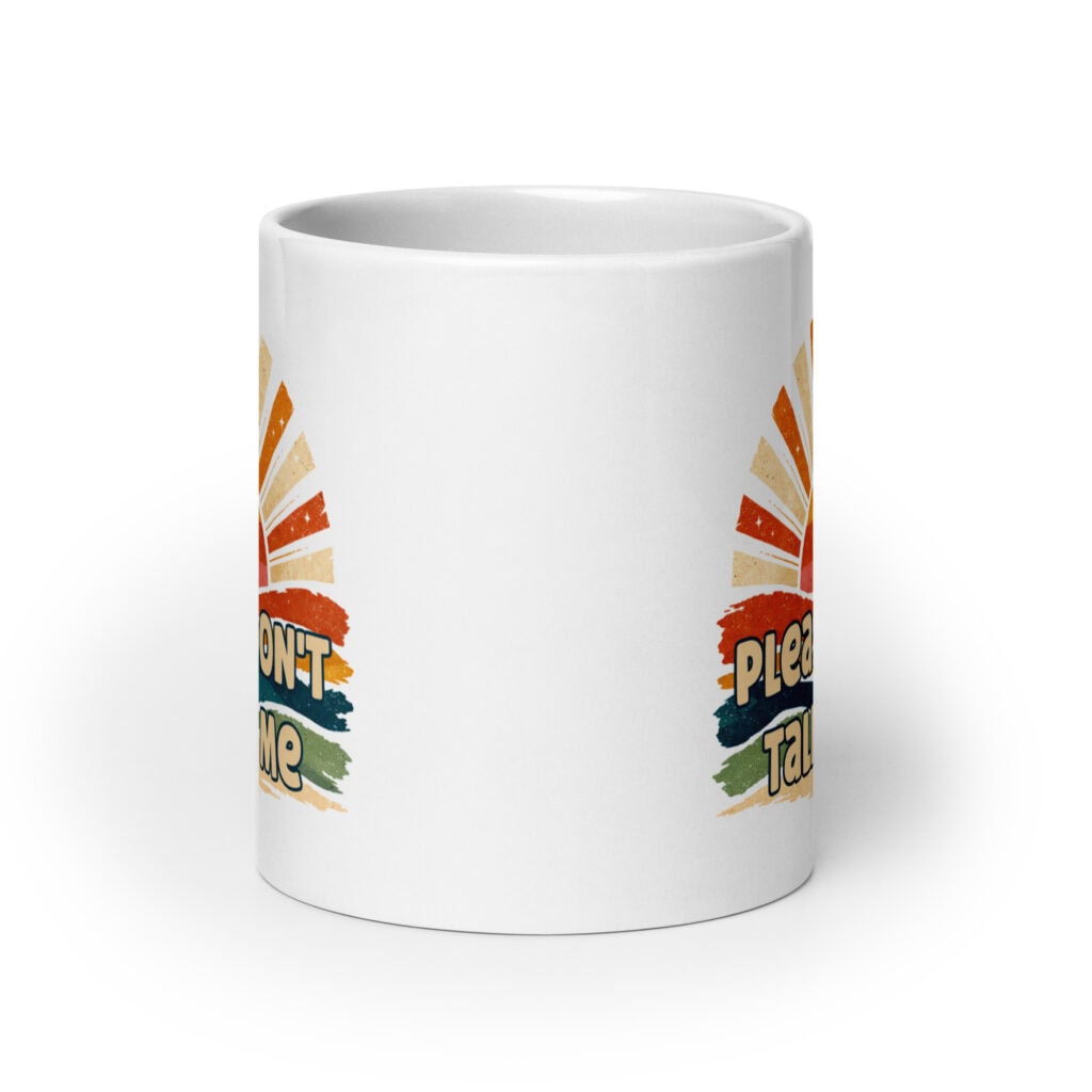 White ceramic mug with a retro sunrise design and the text 'Please don't talk to me' printed on both sides.