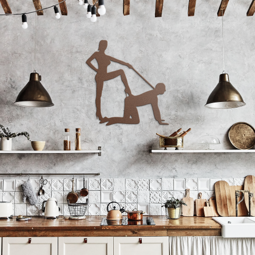 Rustic kitchen with concrete wall, wooden beams, and copper steel wall art mounted between two pendant lights.