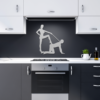 Contemporary kitchen with black backsplash and silver steel wall art mounted above the stove.