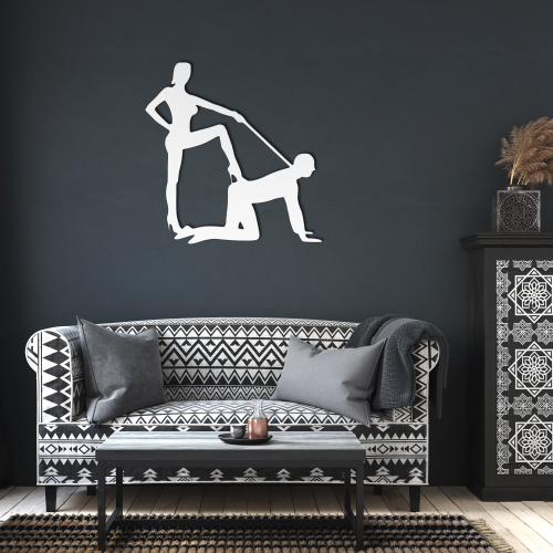 Modern living room with patterned sofa, dark accent wall, and white steel wall art mounted above.