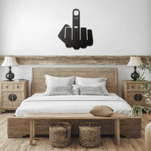 Rustic bedroom with wooden bed frame, neutral bedding, and black steel wall art mounted above the headboard.