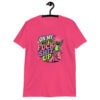 Pink t-shirt with a retro frog and the phrase “On My Way to Fuck Shit Up” printed on the front.