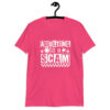 Heliconia pink t-shirt with bold white text reading ‘Adulting is a Scam’ in mixed block and distressed fonts. The design includes a smiley face, star, and flower icons, with a checkerboard stripe along the bottom.