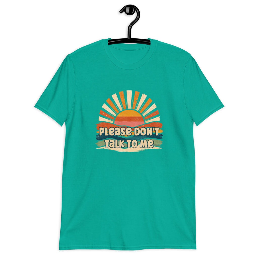 Jade color t-shirt with a retro sunrise design and the text 'Please don't talk to me' printed on the front.