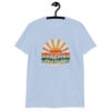 Light blue t-shirt with a retro sunrise design and the text 'Please don't talk to me' printed on the front.