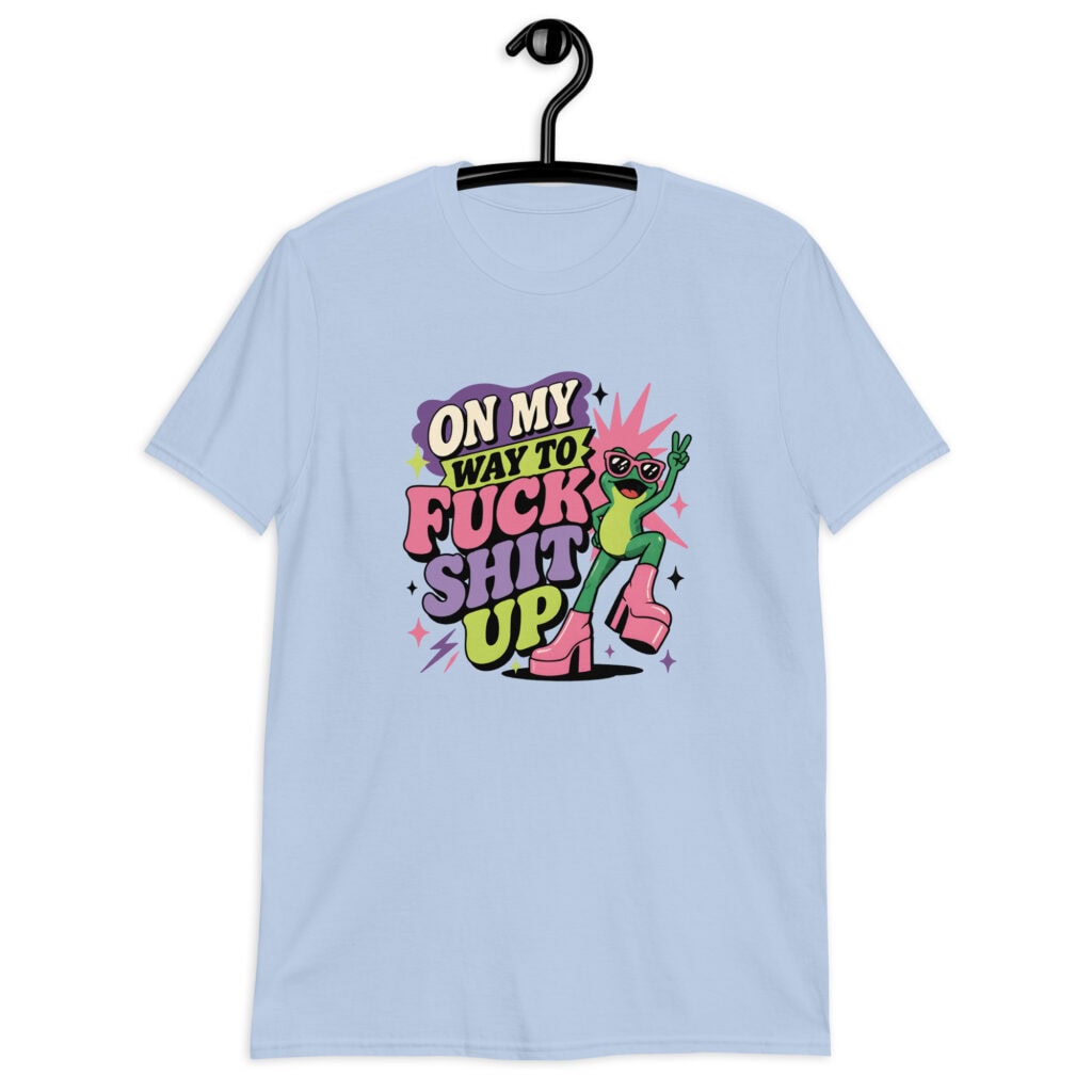 Light blue t-shirt with a retro frog and the phrase “On My Way to Fuck Shit Up” printed on the front.