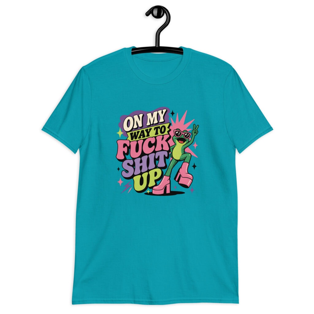 Tropical blue t-shirt with a retro frog and the phrase “On My Way to Fuck Shit Up” printed on the front.