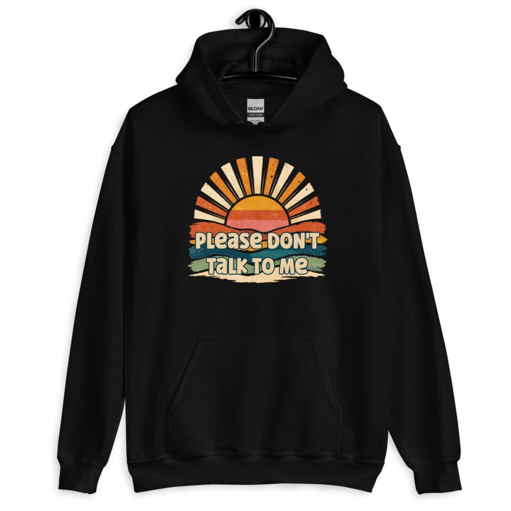 Black hoodie sweatshirt with a retro sunrise design and the text 'Please don't talk to me' printed on the front.