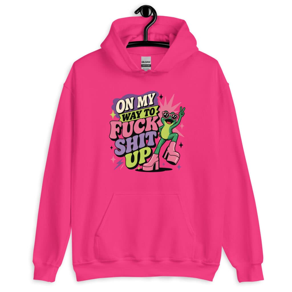 Pink hoodie with a retro frog and the phrase “On My Way to Fuck Shit Up” printed on the front.