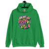 Green hoodie with a retro frog and the phrase “On My Way to Fuck Shit Up” printed on the front.