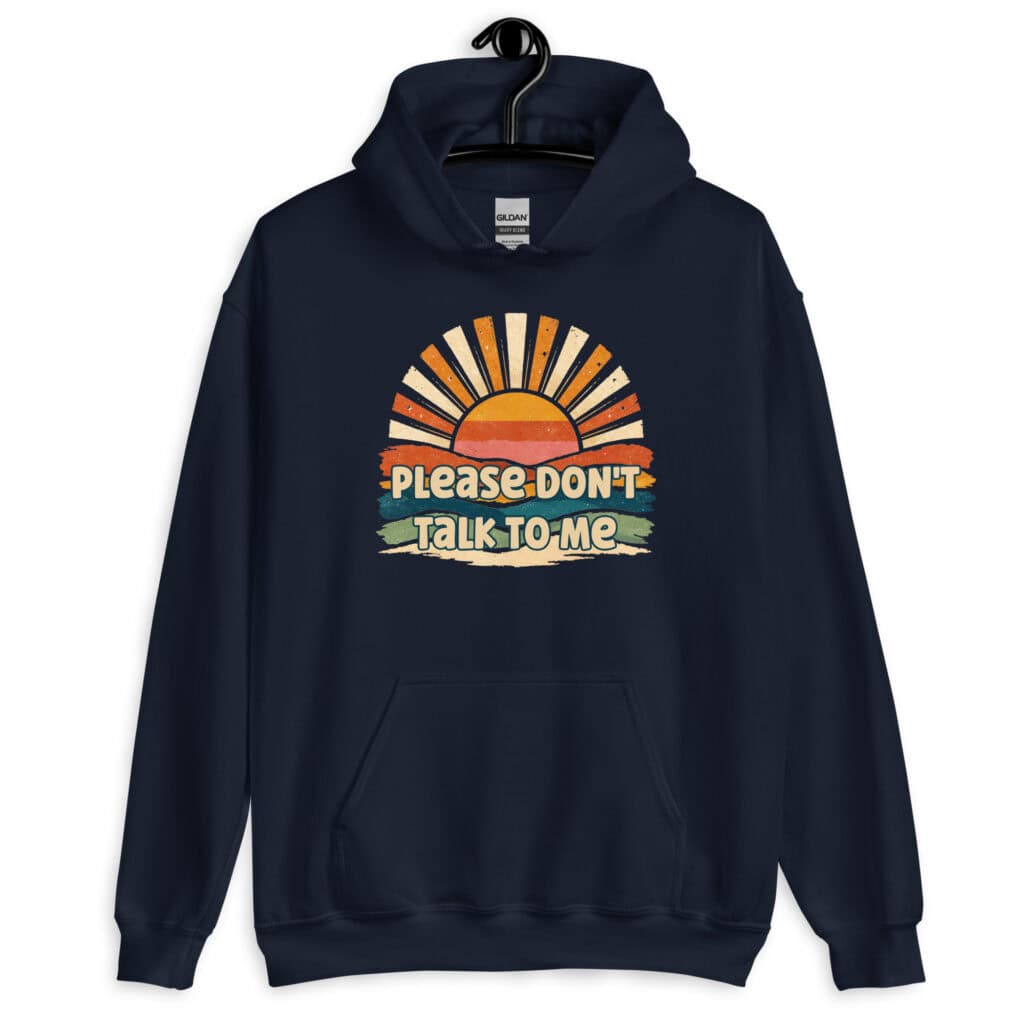 Navy blue hoodie sweatshirt with a retro sunrise design and the text 'Please don't talk to me' printed on the front.