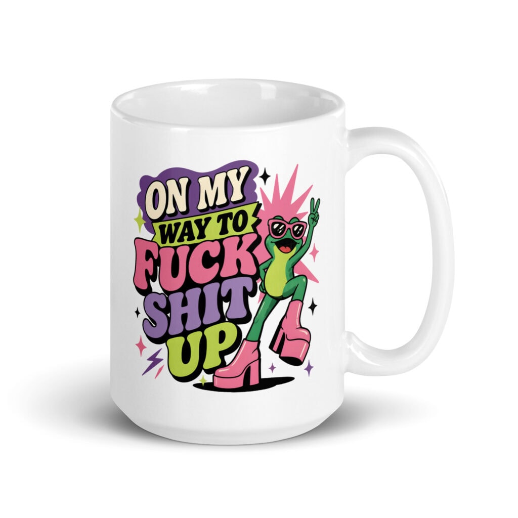 White mug with a retro frog and the phrase “On My Way to Fuck Shit Up.”