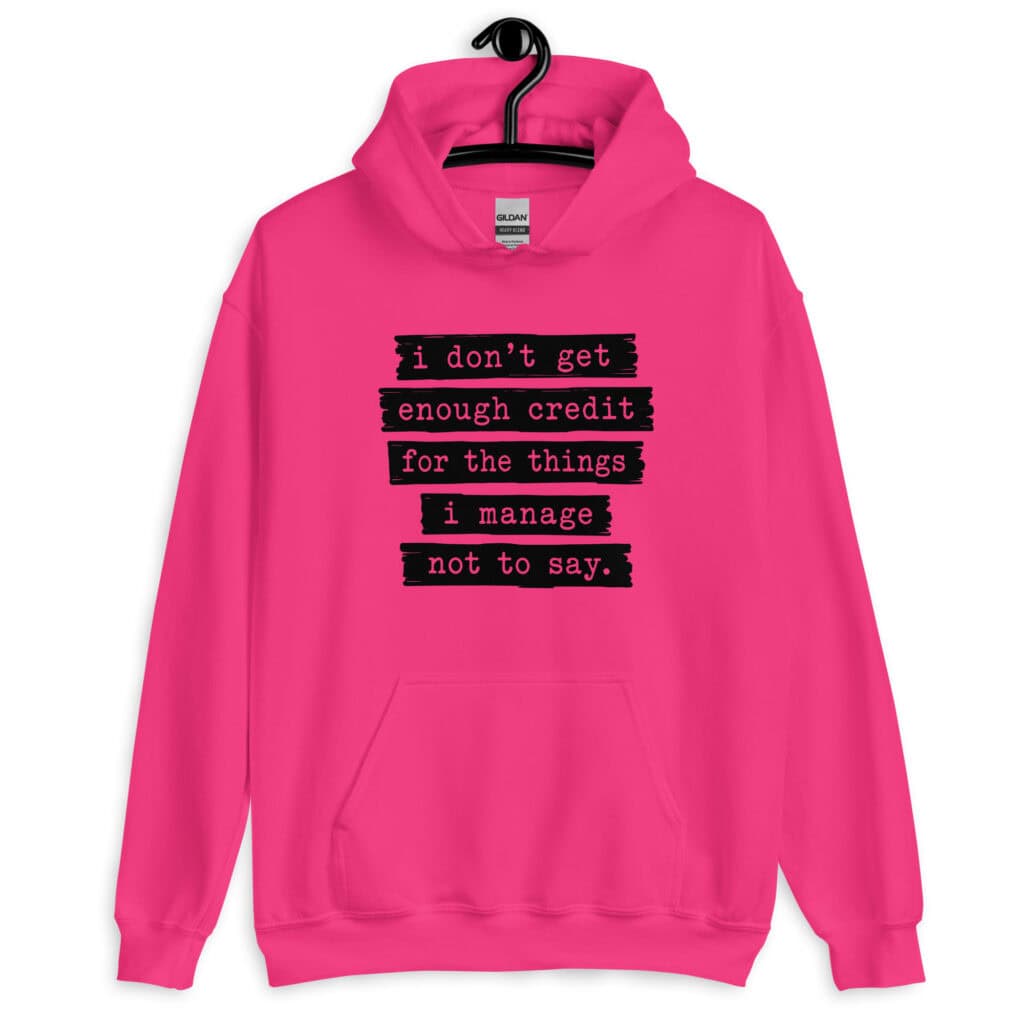 Heliconia pink hoodie sweatshirt with the text 'I don't get enough credit for the things I manage not to say' printed on the front.