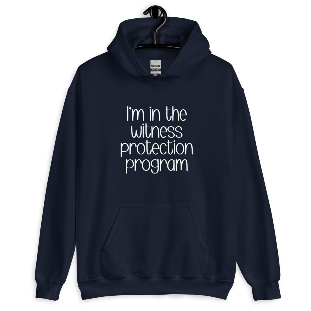 Navy blue hoodie sweatshirt with the text 'I'm in the witness protection program' printed on the front.