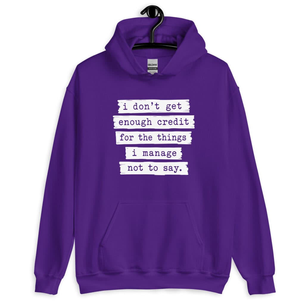 Purple hoodie sweatshirt with the text 'I don't get enough credit for the things I manage not to say' printed on the front.