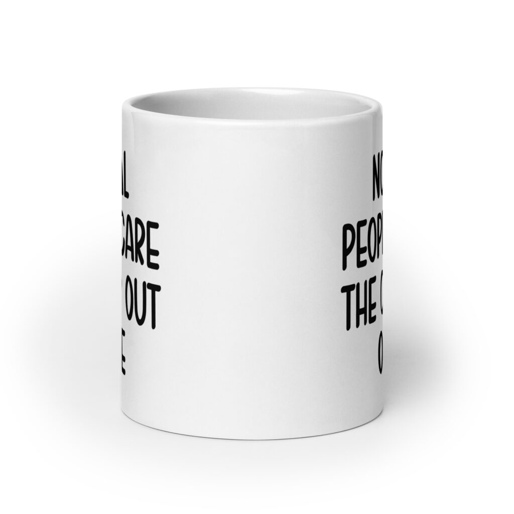 White ceramic mug with the text 'Normal people scare the crap out of me' printed on both sides.