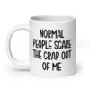 White ceramic mug with the text 'Normal people scare the crap out of me' printed on both sides.