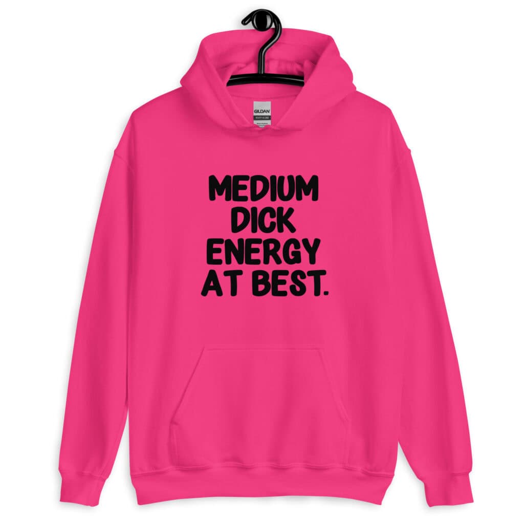 Heliconia pink hoodie sweatshirt with the text 'MEDIUM DICK ENERGY AT BEST.' printed on the front.